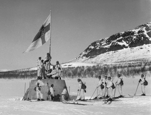 Finnish soldiers raise the flag at the three-country cairn between Norway, Sweden and Finland on 27 April 1945, which marked the end of World War II in Finland.